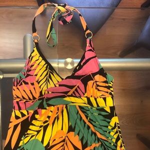 Dress size medium. Brand new. Has built in bra top